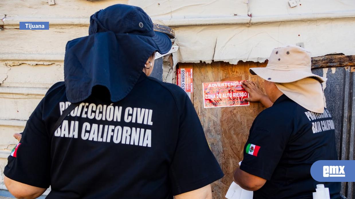 EMX-Colocan engomados de alto riesgo en 37 viviendas asentadas en el Río Tijuana