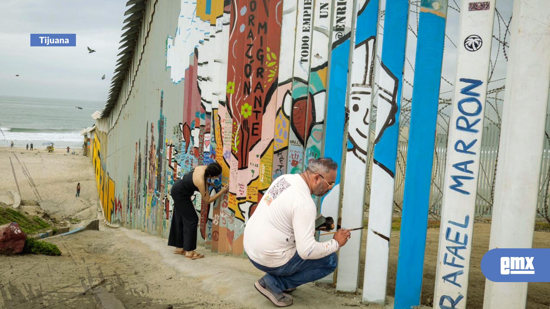 EMX-Plasman-mensajes-por-la-paz-en-el-muro-fronterizo-de-Tijuana